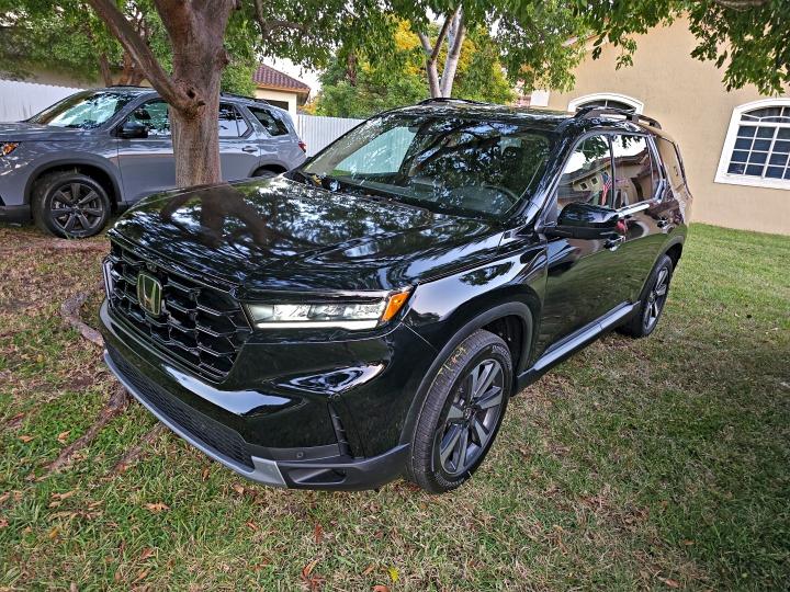 Photo 2 from auction – 2023 HONDA PILOT ELIT with VIN 5FNYG1H88PB048632