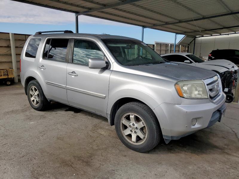 Photo 4 from auction – 2010 HONDA PILOT TOUR with VIN 5FNYF3H99AB002600