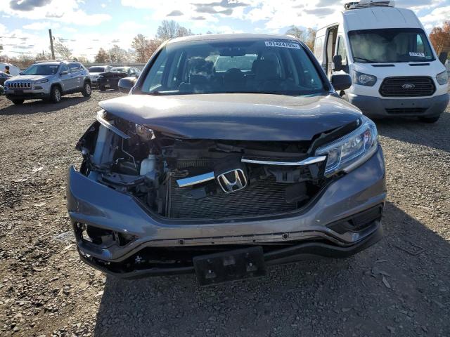Photo 5 from auction – 2015 HONDA CR-V LX with VIN 5J6RM4H37FL077354