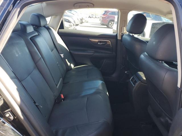 Photo 10 from auction – 2014 NISSAN ALTIMA 2.5 with VIN 1N4AL3AP7EC138509