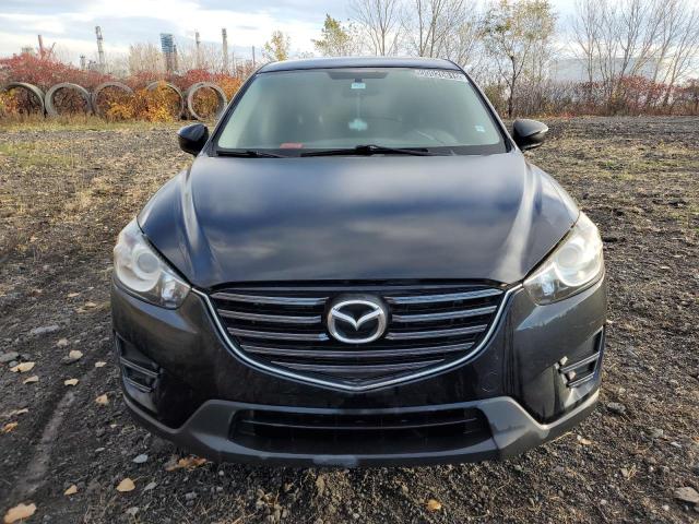 Photo 5 from auction – 2016 MAZDA CX-5 SPORT with VIN JM3KE4BE1G0655005