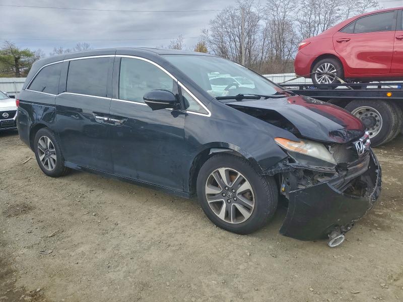 Photo 4 from auction – 2014 HONDA ODDESEY with VIN 5FNRL5H90EB094582