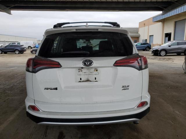 Photo 6 from auction – 2017 TOYOTA RAV4 XLE with VIN JTMRFREV9HJ710311