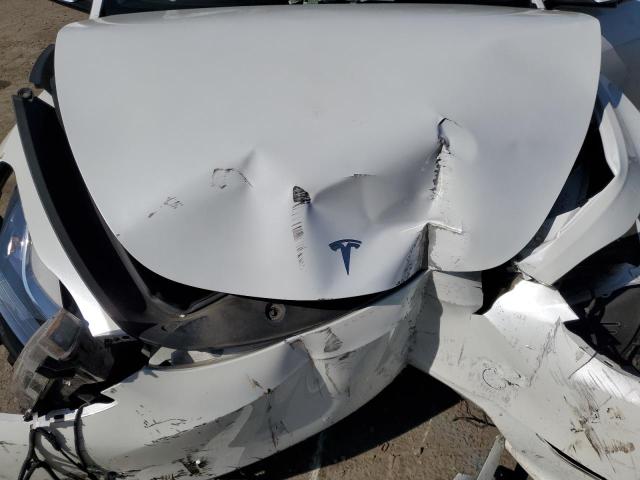 Photo 11 from auction – 2023 TESLA MODEL Y with VIN 7SAYGDEF0PA049598