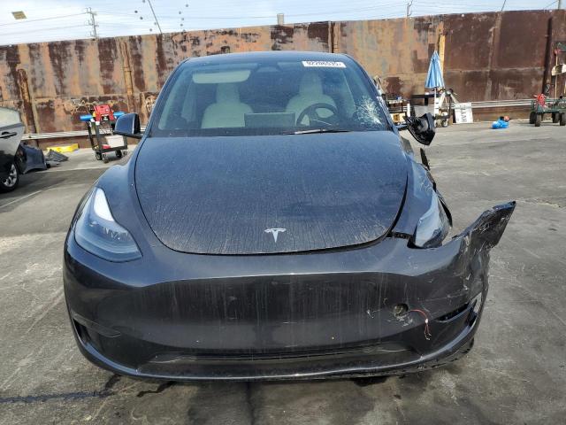 Photo 5 from auction – 2025 TESLA MODEL Y with VIN 7SAYGDEE4SF278238