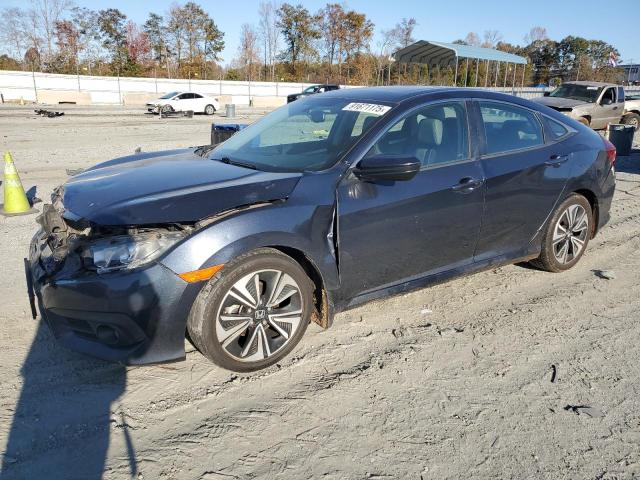 HONDA CIVIC 2016 with VIN 19XFC1F70GE034789 - Photo from auction
