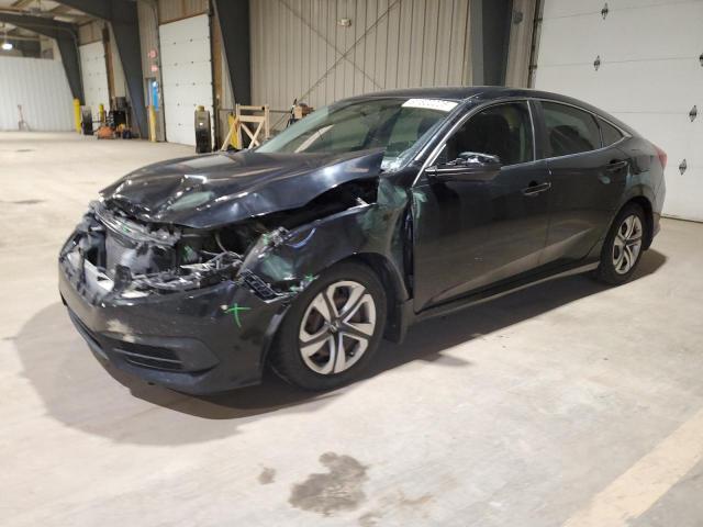 HONDA CIVIC LX 2018 with VIN 19XFC2F52JE019173 - Photo from auction