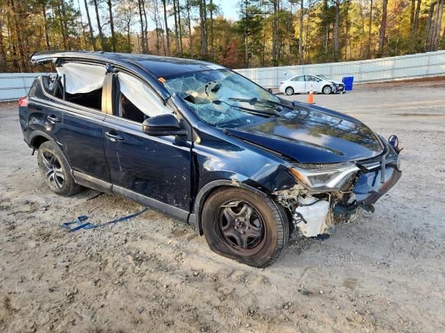 Photo 4 from auction – 2018 TOYOTA RAV4 LE with VIN JTMZFREV2JJ159709