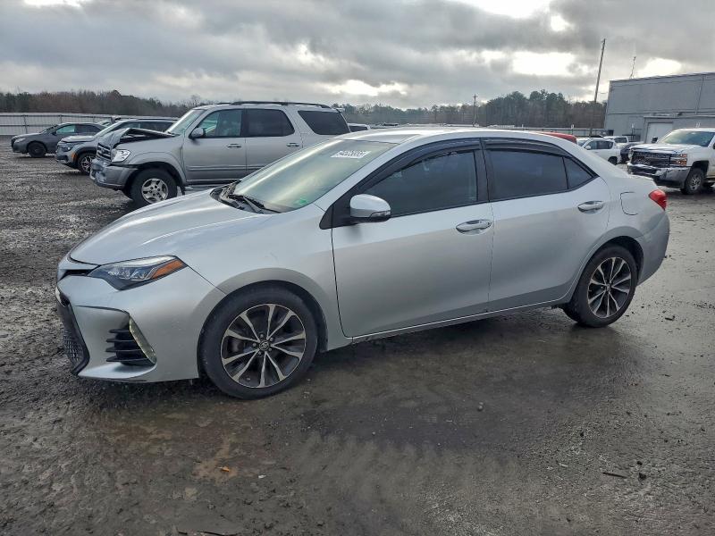 TOYOTA COROLLA L 2017 with VIN 2T1BURHE1HC810613 - Photo from auction