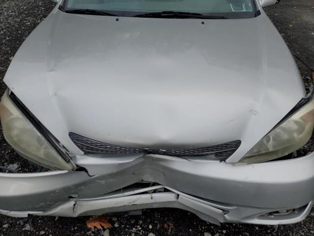 Photo 11 from auction – 2002 TOYOTA CAMRY LE with VIN JTDBF30K520051555