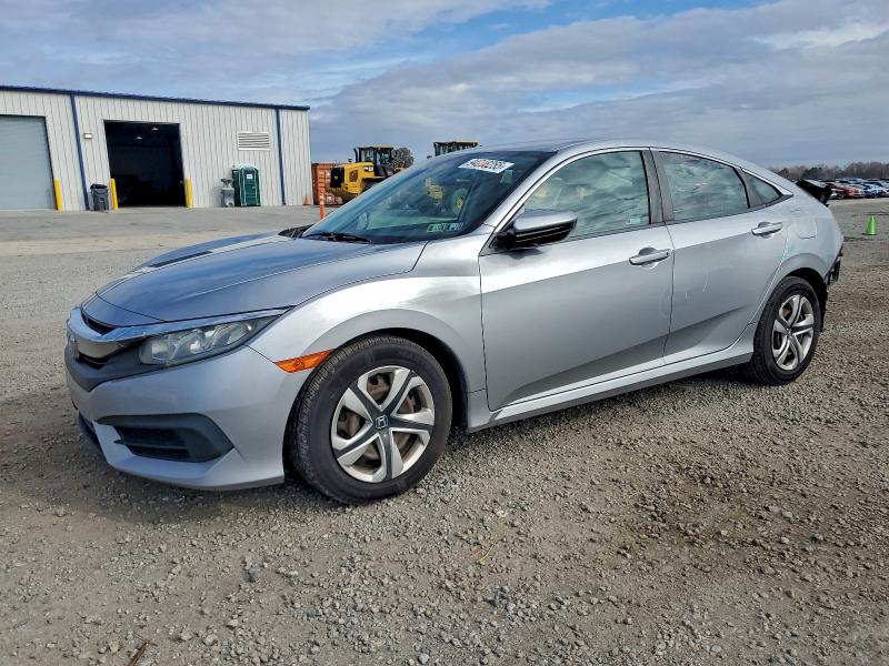 HONDA CIVIC LX 2018 with VIN 19XFC2F56JE200048 - Photo from auction