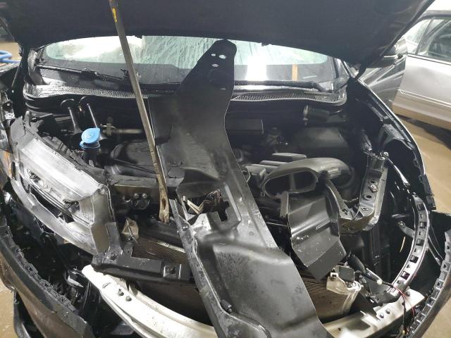 Photo 11 from auction – 2023 HONDA PASSPORT E with VIN 5FNYF8H56PB030230