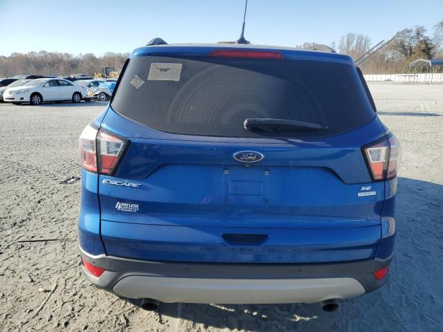 Photo 6 from auction – 2018 FORD ESCAPE SE with VIN 1FMCU0GD8JUC62381