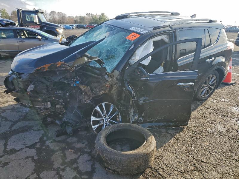 TOYOTA RAV4 LIMIT 2016 with VIN 2T3DFREV0GW472567 - Photo from auction