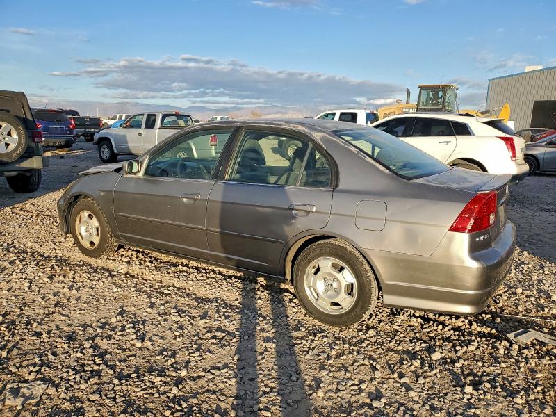 Photo 2 from auction – 2004 HONDA CIVIC HYBR with VIN JHMES96694S009482
