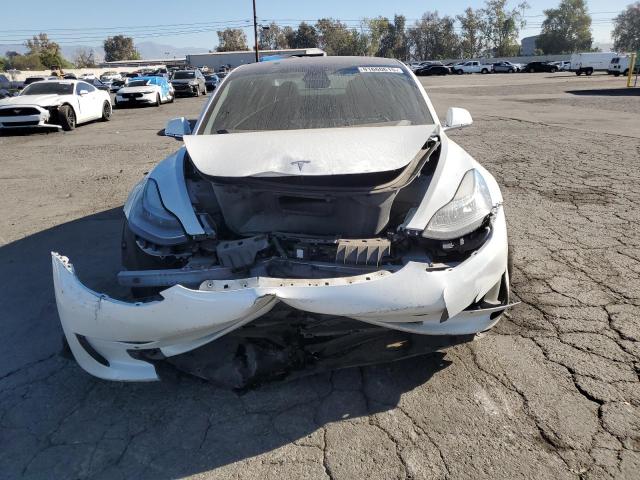 Photo 5 from auction – 2018 TESLA MODEL 3 with VIN 5YJ3E1EB4JF084258
