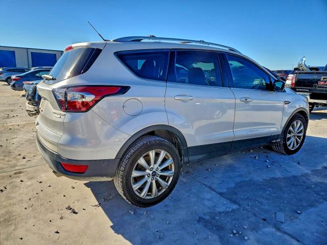 Photo 3 from auction – 2017 FORD ESCAPE TIT with VIN 1FMCU0J98HUD10069
