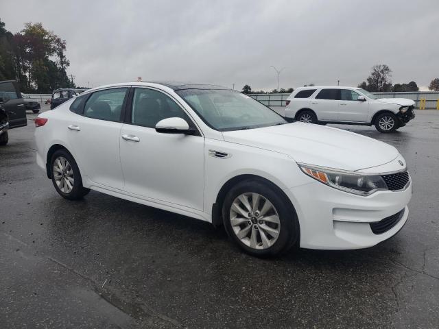 Photo 4 from auction – 2016 KIA OPTIMA EX with VIN 5XXGU4L32GG119080