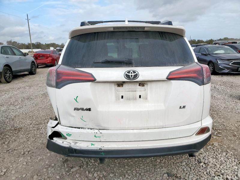 Photo 6 from auction – 2017 TOYOTA RAV4 LE with VIN JTMZFREV2HJ122525