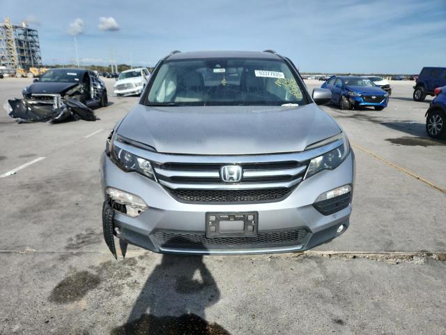 Photo 5 from auction – 2016 HONDA PILOT with VIN 5FNYF6H9XGB082029