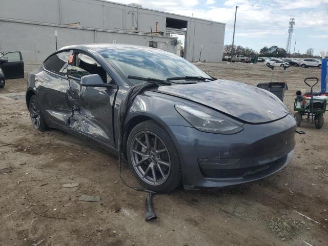 Photo 4 from auction – 2023 TESLA MODEL 3 with VIN 5YJ3E1EA9PF400298