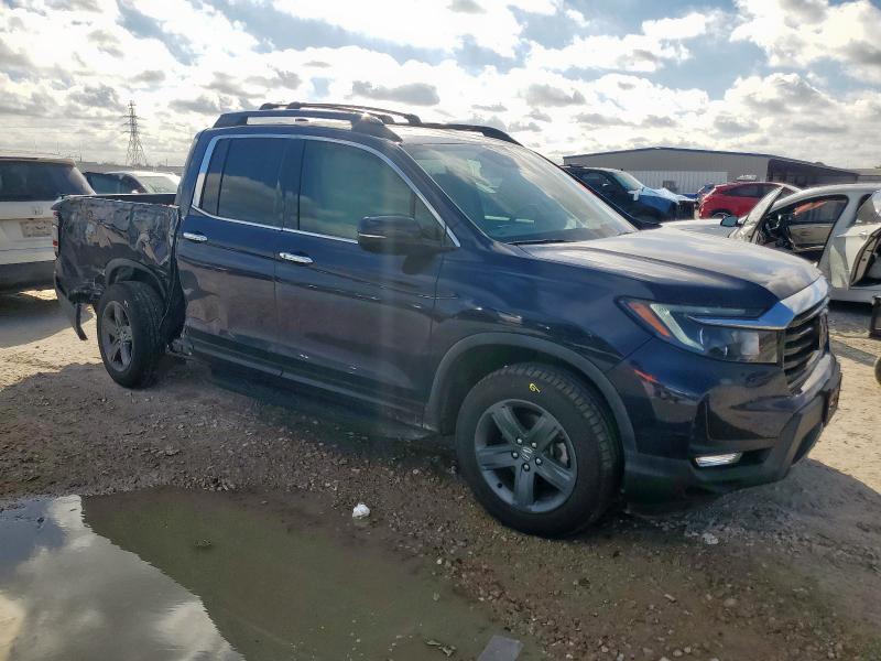 Photo 4 from auction – 2023 HONDA RIDGELINE with VIN 5FPYK3F79PB025744