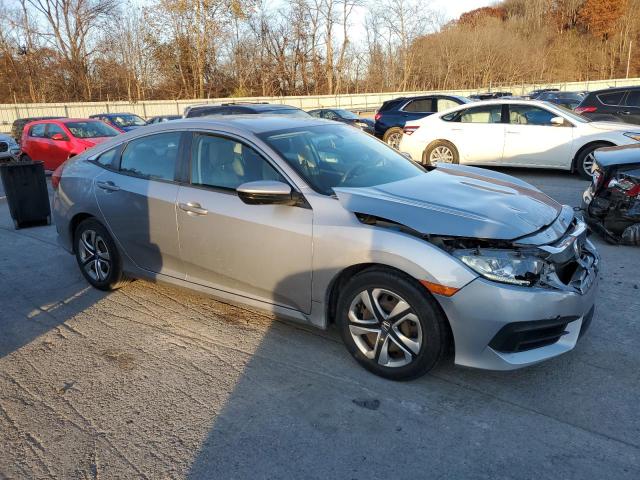 Photo 4 from auction – 2018 HONDA CIVIC LX with VIN 2HGFC2F59JH572022