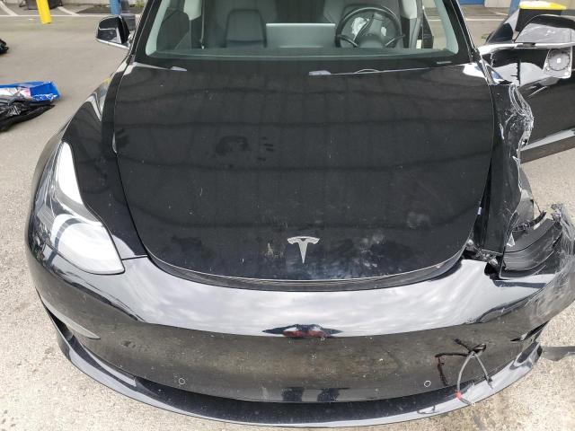 Photo 11 from auction – 2018 TESLA MODEL 3 with VIN 5YJ3E1EA1JF031329