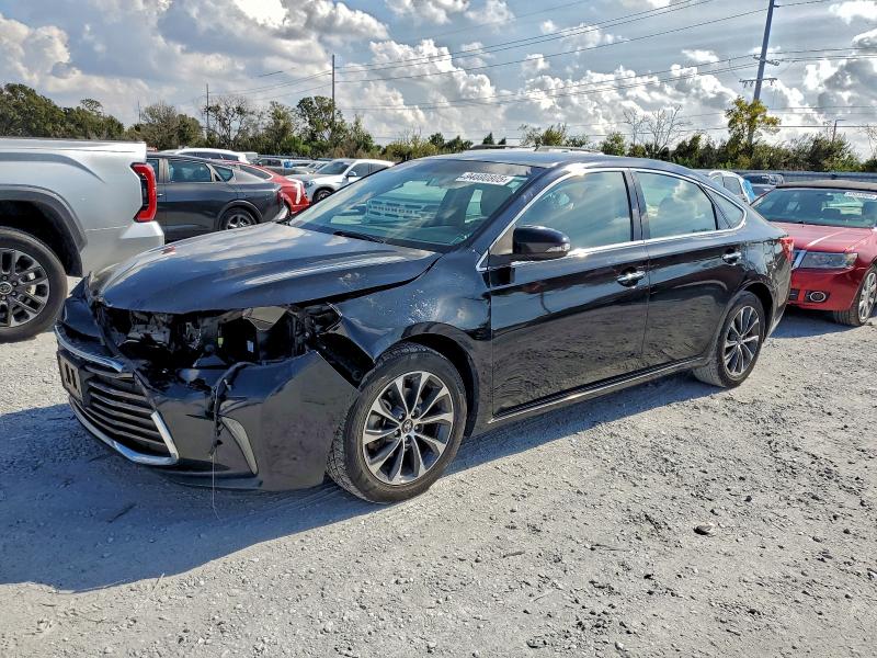 TOYOTA AVALON XLE 2016 with VIN 4T1BK1EB4GU236121 - Photo from auction
