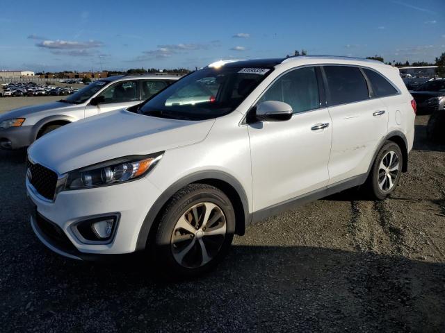 KIA SORENTO EX 2016 with VIN 5XYPH4A18GG125323 - Photo from auction