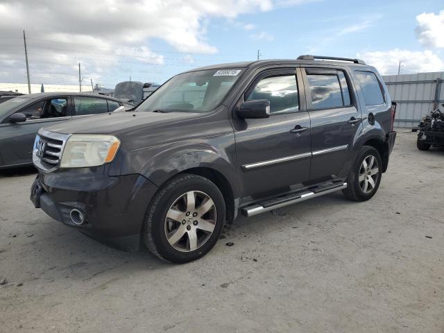HONDA PILOT TOUR 2012 with VIN 5FNYF3H93CB008279 - Photo from auction