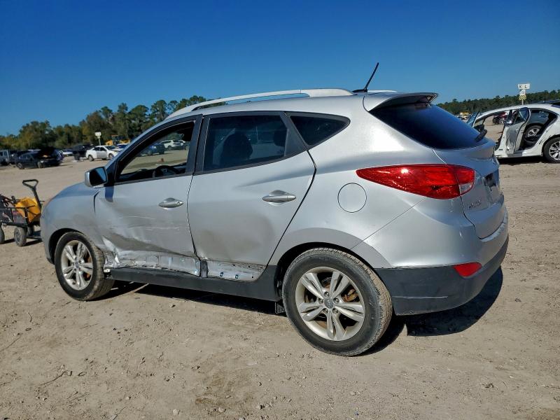 Photo 2 from auction – 2011 HYUNDAI TUCSON with VIN KM8JU3AC0BU279198