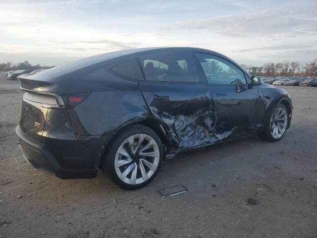 Photo 3 from auction – 2026 TESLA MODEL Y with VIN 7SAYGDEE7TF323626