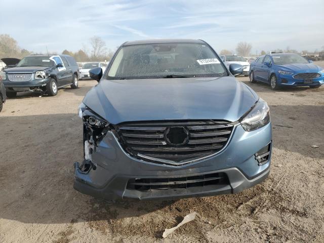 Photo 5 from auction – 2016 MAZDA CX-5 GT with VIN JM3KE2DY8G0624751