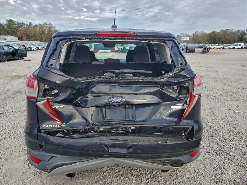 Photo 6 from auction – 2016 FORD ESCAPE SE with VIN 1FMCU0GX5GUB74830