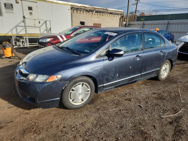 HONDA CIVIC HYBR 2010 with VIN JHMFA3F21AS000532 - Photo from auction