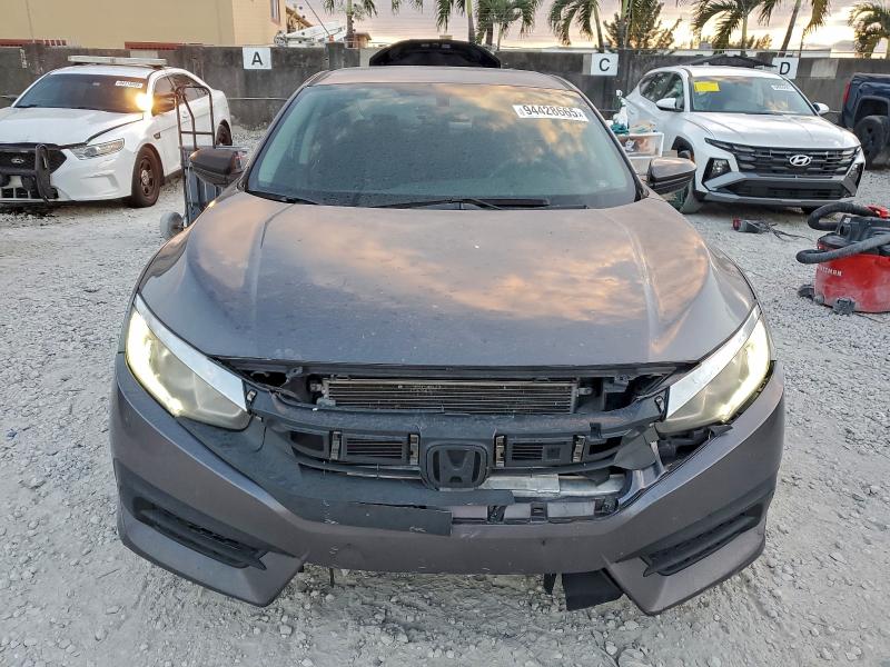Photo 5 from auction – 2017 HONDA CIVIC LX with VIN 19XFC2F59HE017124