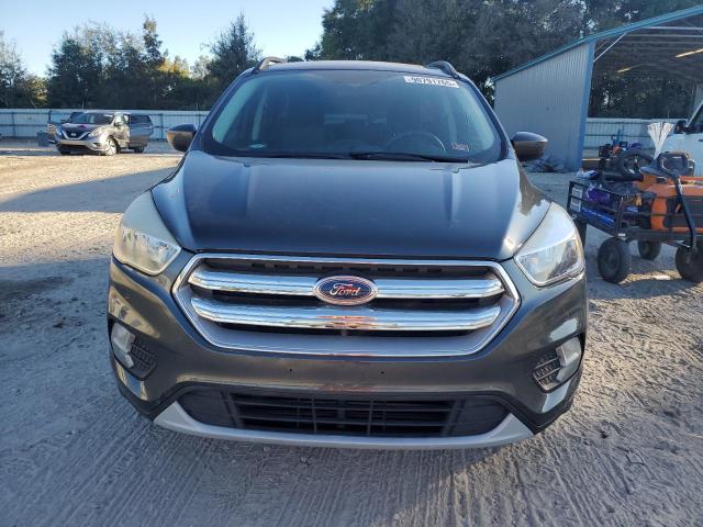 Photo 5 from auction – 2018 FORD ESCAPE SE with VIN 1FMCU0G97JUC20909