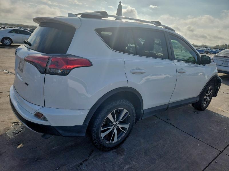 Photo 3 from auction – 2016 TOYOTA RAV4 XLE with VIN JTMWFREV9GJ083871