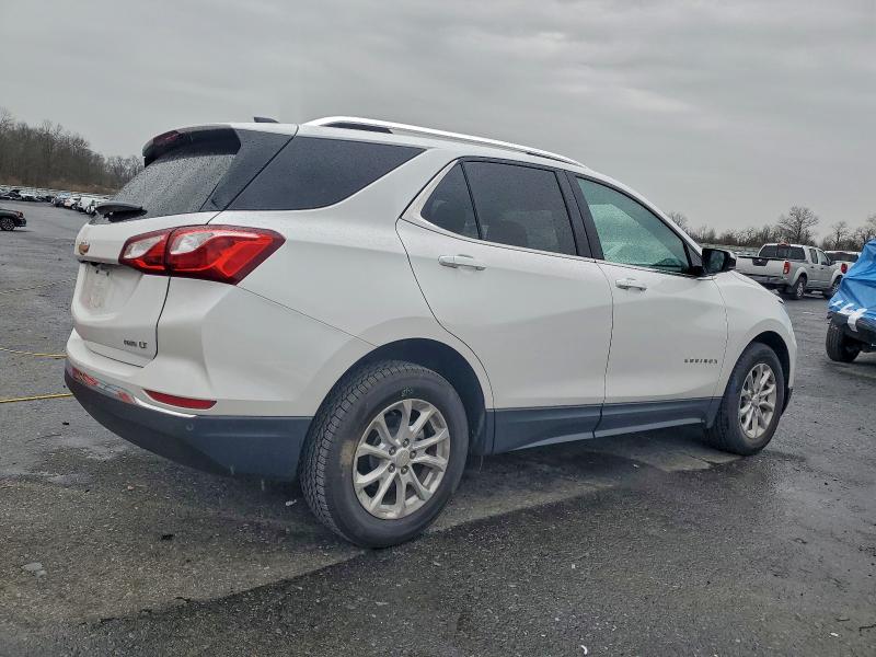 Photo 3 from auction – 2021 CHEVROLET EQUINOX LT with VIN 3GNAXUEVXMS141997