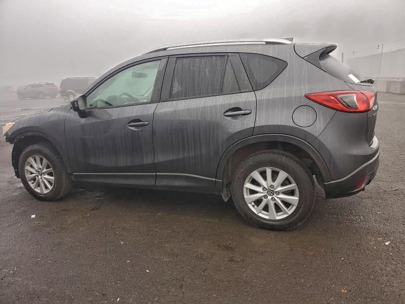 Photo 2 from auction – 2014 MAZDA CX-5 TOURI with VIN JM3KE2CY1E0365065