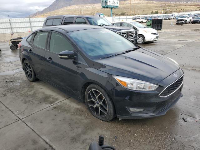 Photo 4 from auction – 2015 FORD FOCUS SE with VIN 1FADP3F25FL220853
