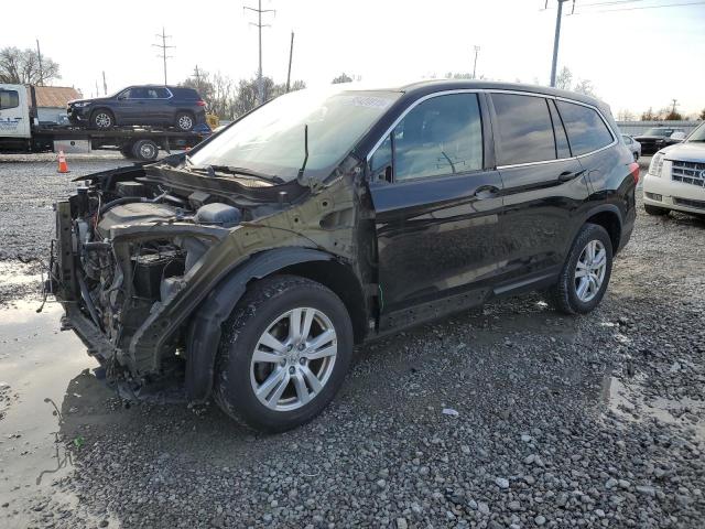 HONDA PILOT LX 2018 with VIN 5FNYF6H1XJB033740 - Photo from auction
