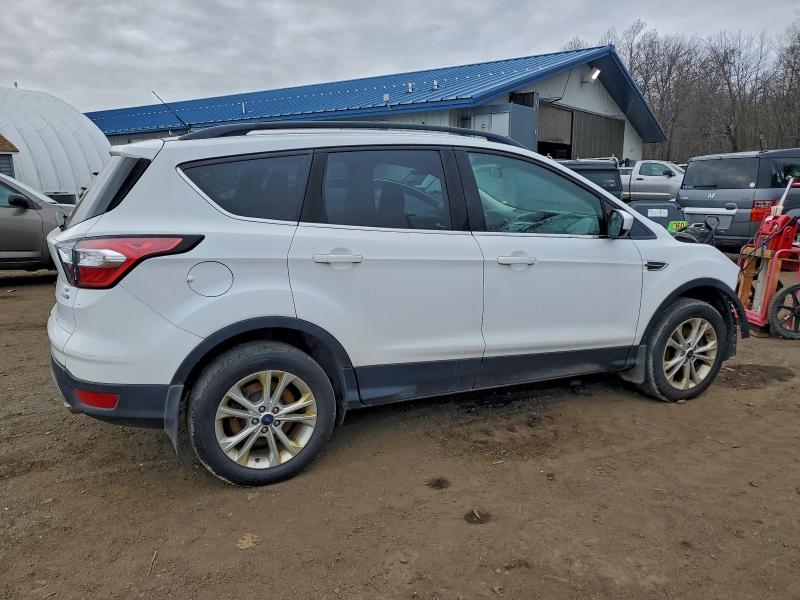 Photo 3 from auction – 2018 FORD ESCAPE with VIN 1FMCU9GDXJUA74949