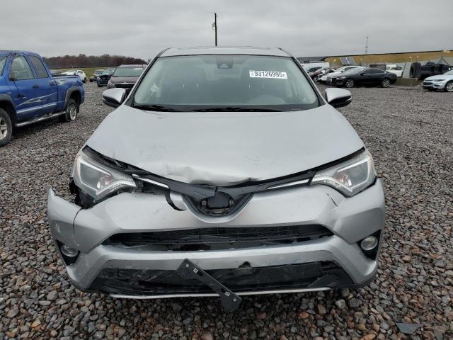 Photo 5 from auction – 2018 TOYOTA RAV4 with VIN 2T3RFREV7JW814853