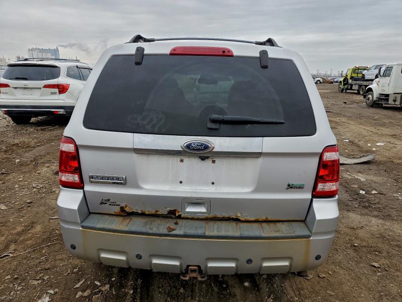 Photo 6 from auction – 2010 FORD ESCAPE LIM with VIN 1FMCU9EG7AKD17268