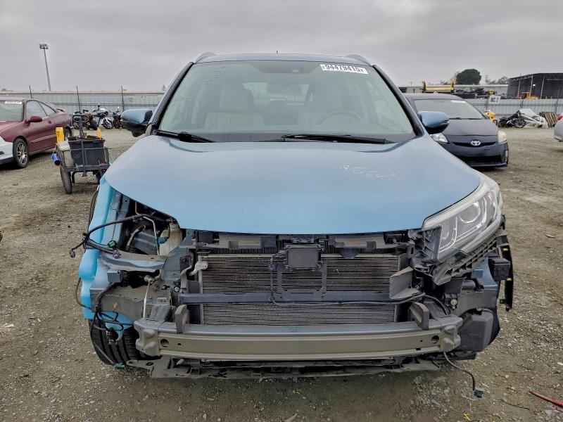 Photo 5 from auction – 2015 HONDA CR-V with VIN 5J6RM4H96FL047590