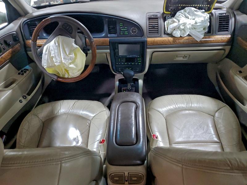 Photo 8 from auction – 1999 LINCOLN CONTINENTA with VIN 1LNHM97V8XY715869