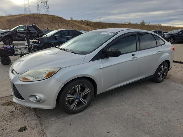 FORD FOCUS SE 2014 with VIN 1FADP3F21EL173142 - Photo from auction