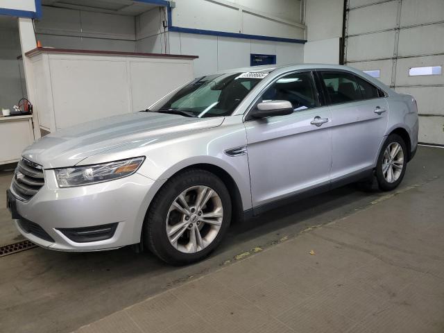 FORD TAURUS SEL 2015 with VIN 1FAHP2E8XFG165021 - Photo from auction